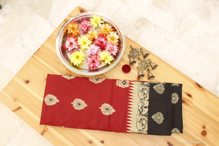 Eye-catching red black soft silk saree with golden zari