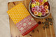 Luxurious mustard and red grand Banarasi Katan silk saree with lush golden and silver zari