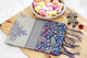 Red yellow and silver floral Pashmina raphsody with intricate silver zari and blue pallu