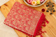 Gorgeous red and golden silk saree with golden zari all over