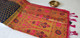 Enchanting dark blue Paithani silk saree with pink and green designs and golden zari