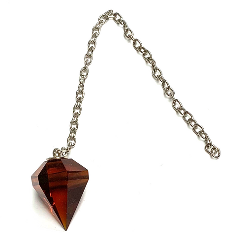 Spiritual Amber Cut Crystal Pendulum on Silver Chain 1.07" x 1.6" x 11" Long Spiritual Amber Cut Crystal Pendulum on Silver Chain 1.07" x 1.6" x 11" Long