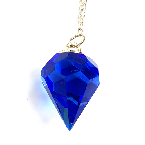 Calming Sapphire Cut Crystal Pendulum on Silver Chain .65" x 12" Long Calming Sapphire Cut Crystal Pendulum on Silver Chain .65" x 12" Long
