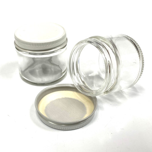 2" 2oz Glass Jar w/ White Lid (24 PACK CASE) 2" 2oz Glass Jar w/ White Lid (24 PACK CASE)