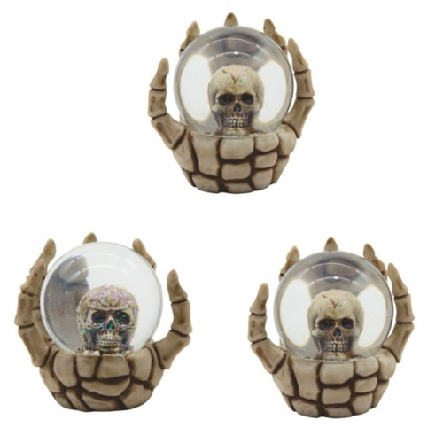 Skull Snow Globe in Skeleton Hand 3 Piece Set 3 3/4"W Skull Snow Globe in Skeleton Hand 3 Piece Set 3 3/4"W