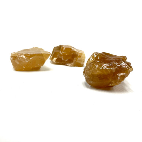 Amber Colored Rough Calcite by the Pound Amber Colored Rough Calcite by the Pound