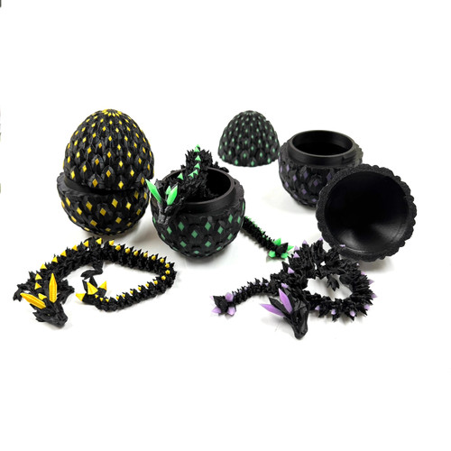 Luminous and Black Glow in Dark Dragon in Egg 10” Long Luminous and Black Glow in Dark Dragon in Egg 10” Long