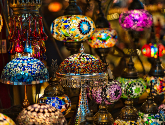 Turkish mosaic lamps merchandised on a small table display