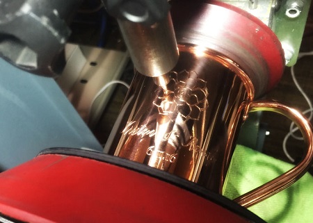 Custom diamond drag tip engraving on copper mugs