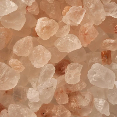 Irregular blocks of pink rock salt