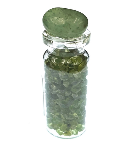 Glass bottle of tumbled peridot stones with peridot accented lid