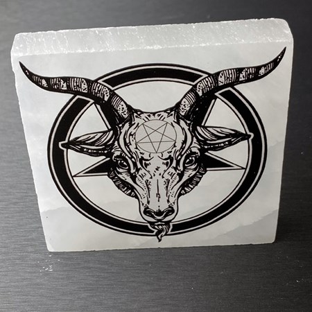 Square selenite slab with UV printed black goat-head design