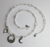 Iridescent crystals and hearts along with tiny glass pearls complete the "lunar glow" of the Song to the Moon bracelet