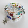 The La Boheme Bracelets tells the story of the opera through symbolic beads and charms. A perfect gift for opera lovers.