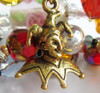 Detail of the jester charm, symbolizing the character of Rigoletto.