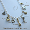 Unique necklace celebrating the operas of Guiseppe Verdi with symbolic charms. This piece makes a great gift for opera lovers!