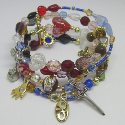 The Romeo and Juliet Bracelet. Bead and charms represent the iconic story.