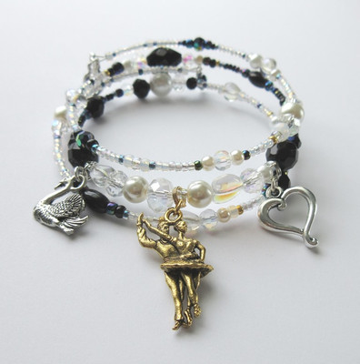 The Swan Queen bracelet represents Odette and her double, the black swan Odile.