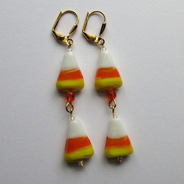 Halloween Earrings featuring lampworked glass "Candy Corn" with orange crystals.