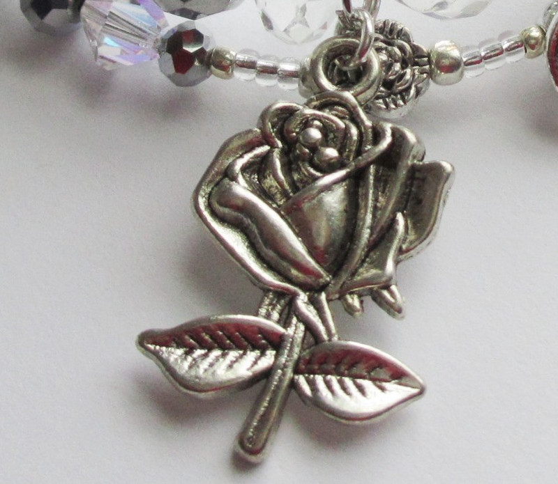 A pewter charm of the rose given to Sophie by Octavian.