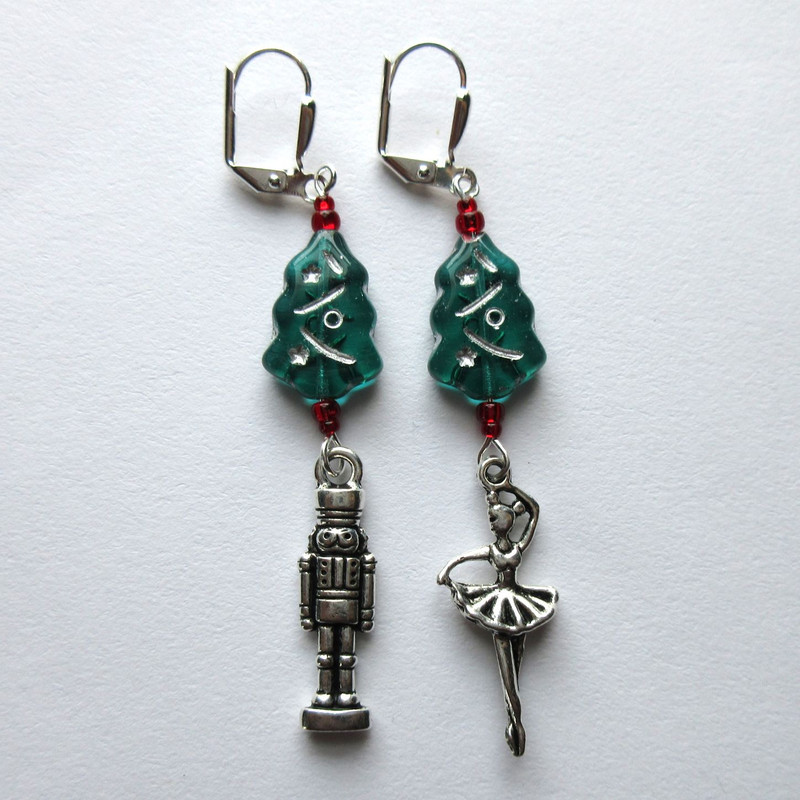 The Nutcracker Earrings represents Tchaikovsky's holiday ballet with symbolic beads and charms. Makes a meaningful gift for ballerinas, ballet lovers and anyone who considers The Nutcracker to be a family holiday tradition.
