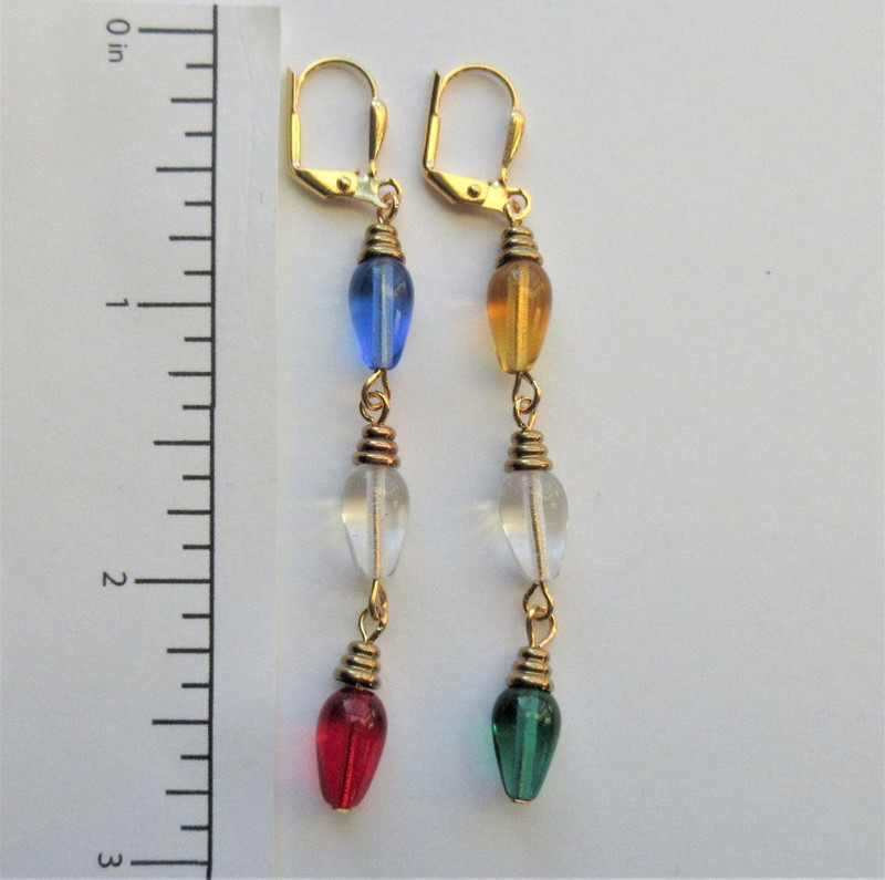 Czech pressed glass beads configured to look like Christmas Holiday lights! A unique accent to your holiday wardrobe!