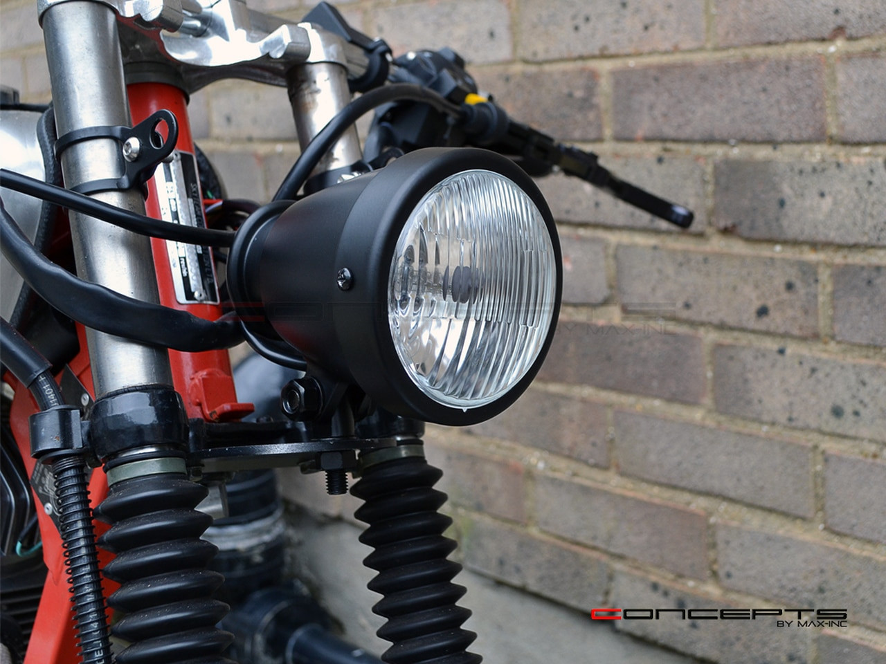 thumbnail image 2 of 4.5" (4 1/2 Inch) Bottom Mount Halogen Motorcycle Headlight - Matte Black With Clear Lens 2 of 14
