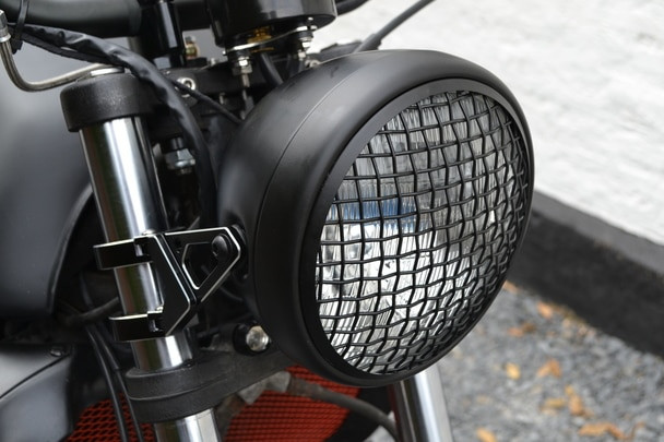 Wire Mesh Motorcycle Headlight | 7" Lens H4 DOT | 7.75 " overall ID