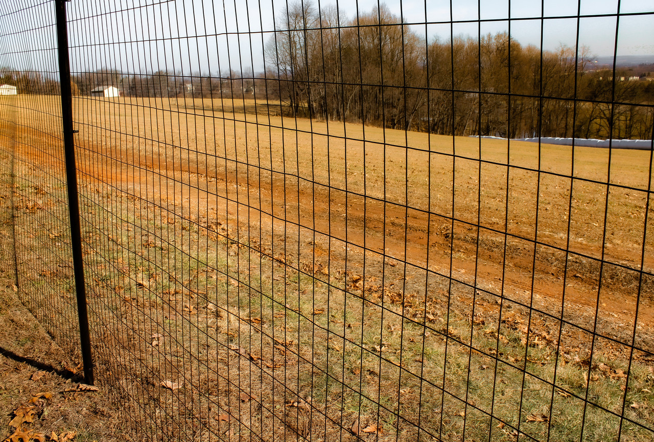 Welded wire fence clearance