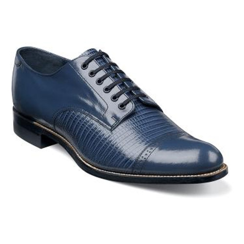 Known fondly by long-time Stacy Adams fans as the ÛÏOriginal Stacy Adams Biscuit Toe,Û the lizard print version of the MadisonÛªs got it all: rich leather, exotic print, and a myriad of color options that never fail to impress.

The Madison is a cap toe lace-up.
The upper is kidskin leather with lizard print leather.
The linings are leather.
The sole is leather and is crafted with genuine Goodyear welt construction.