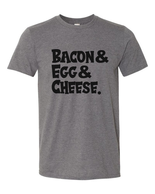Breakfast lovers, this one's for you! Show off your favorite morning combo with this bold "Bacon & Egg & Cheese" graphic tee. Made from soft, comfortable fabric with a classic unisex fit, it's perfect for brunch, weekends, or everyday wear.