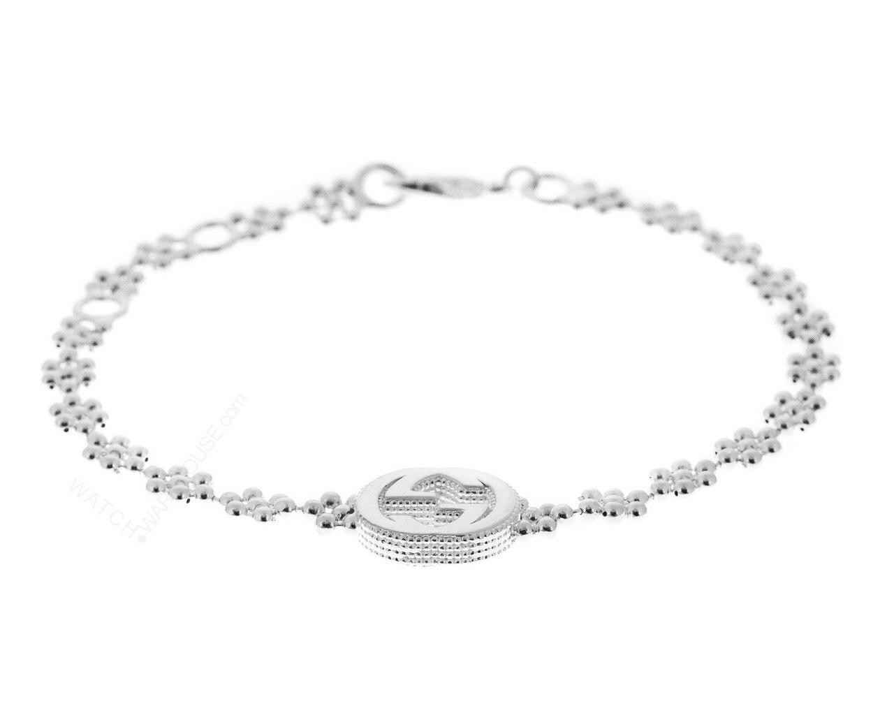 GUCCI Interlocking Silver GG Bracelet with Flower Motifs 