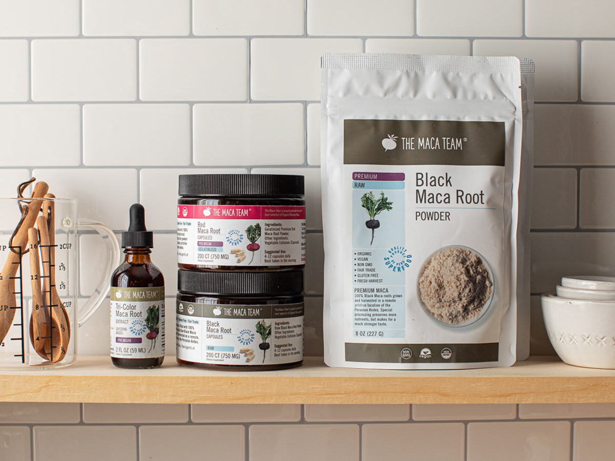 Maca powder, capsules, and extract displayed together on a shelf