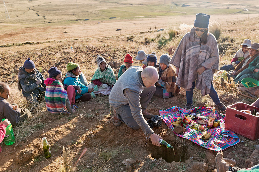 Preparing the earth for maca planting in the Peruvian Andes