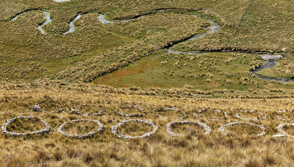 Ruins of traditional maca storage silos in the Peruvian Andes