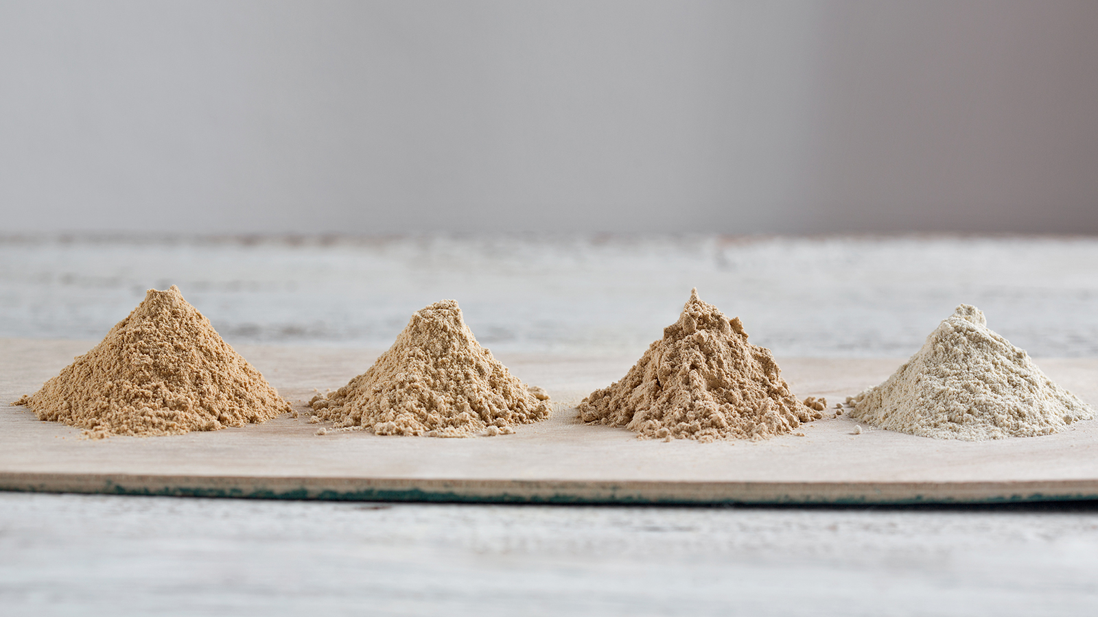 Different types of maca powder shown side by side
