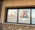Restaurant storefront window decal featuring "Mi Rancho" logo with orange and gray branding, initials "MR," and a longhorn graphic. Custom vinyl decals for restaurants, bars, and dining establishments.
