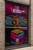 Custom video game company window decal with neon-style graphics in blue, pink, and yellow. Text promotes gaming, birthday parties, camps, and STEM classes for Athlete Lab Academy. Perforated vinyl storefront decal for eSports and gaming businesses.
