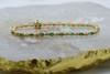 14K Yellow Gold Emerald Navette and Round Diamond Bracelet Circa 1970