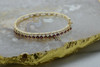 14K Yellow Gold Garnet Hinged Bangle Bracelet Victorian Style Circa 1970