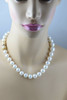 Superb Large Sea Pearl Necklace with 18K Yellow Gold Ruby and Diamond Clasp