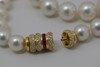 Superb Large Sea Pearl Necklace with 18K Yellow Gold Ruby and Diamond Clasp