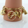 Massive Charm Bracelet set in 14K Yellow Gold Worldwide and Whimsey