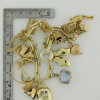 Massive Charm Bracelet set in 14K Yellow Gold Worldwide and Whimsey