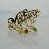 14K Yellow Gold Mother Pin Pendant with Emerald Garnet and Peridot Circa 1970