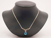 10K Yellow Gold Pear Shaped Blue Topaz and Diamond Chip Pendant on a 17" Chain