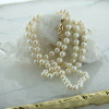 14K Yellow Gold White Pearl Necklace with Filigree Clasp 25 Inch Long Circa 1970