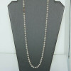 14K Yellow Gold White Pearl Necklace with Filigree Clasp 25 Inch Long Circa 1970