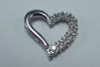 10K White Gold Heart Shaped Pendant with Diamond Chips