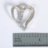 10K White Gold Heart Shaped Pendant with Blue Topaz Swirl